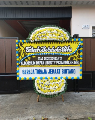 Papan Bunga Duka di Pandowan